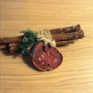 Rustic Cinnamon Stick Bundle with Dried Fruit Accent